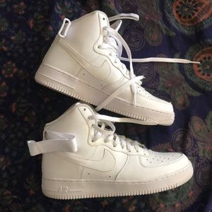 All white high top Nike Air Force 1s AF1